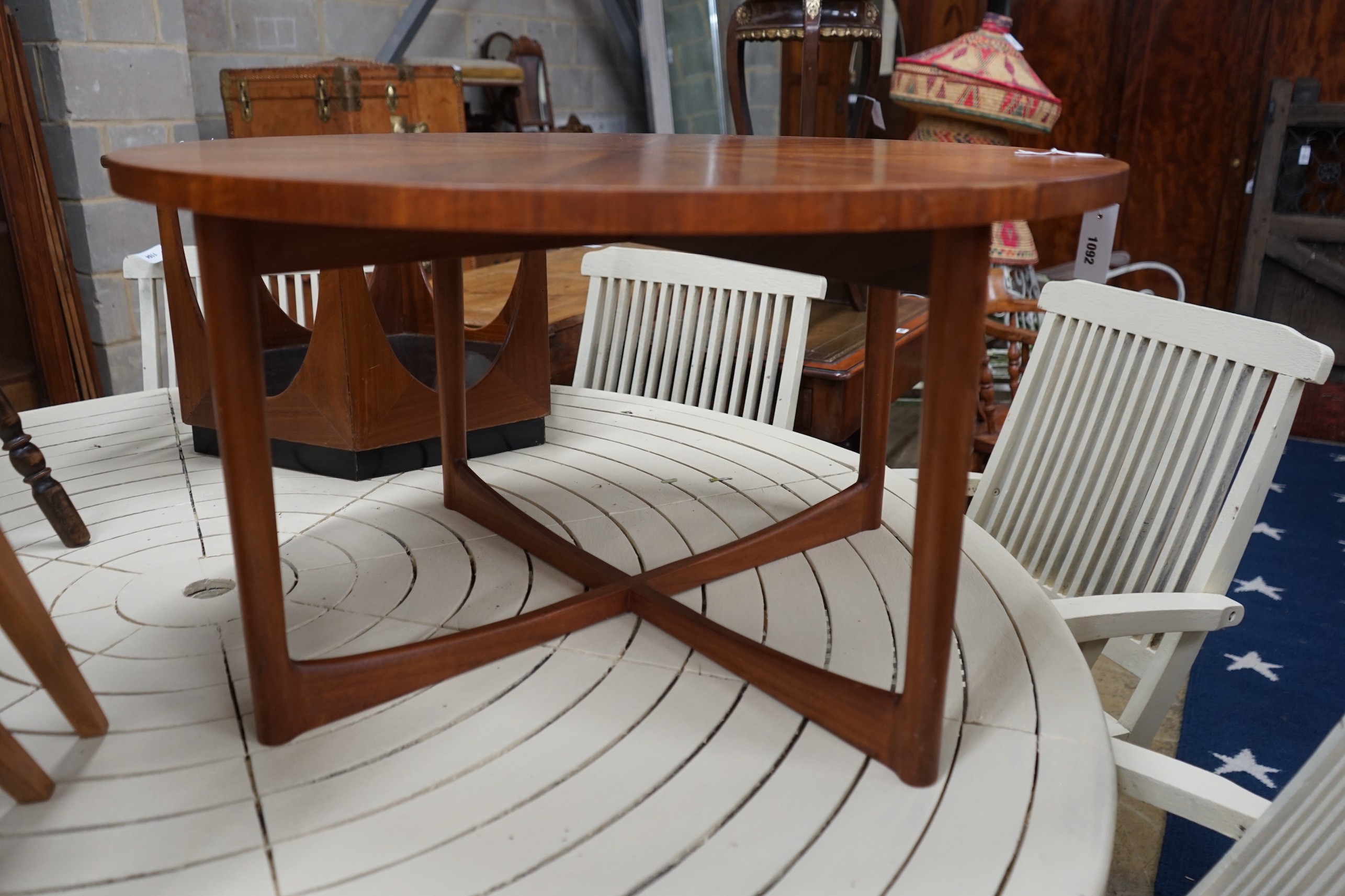 A Danish teak segmented top 1960's circular coffee table, diameter 83cm, height 46cm